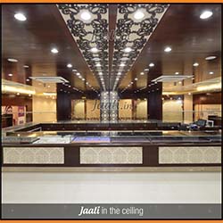 Ethnique MDF Jaalis running along on the ceiling & continuing down on the wall  copy